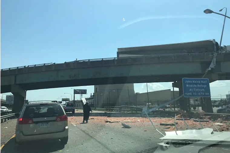 A tractor-trailer crashed on an I-95 exit ramp near the Walt Whitman Bridge on Saturday afternoon, spilling watermelons and other debris that led to a fatal crash on the southbound lanes below.