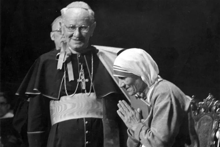 Mother Teresa with Cardinal John Krol during her visit to Immaculata College in 1976. Pope Francis on Sunday will proclaim Mother Teresa of Calcutta a Roman Catholic saint.