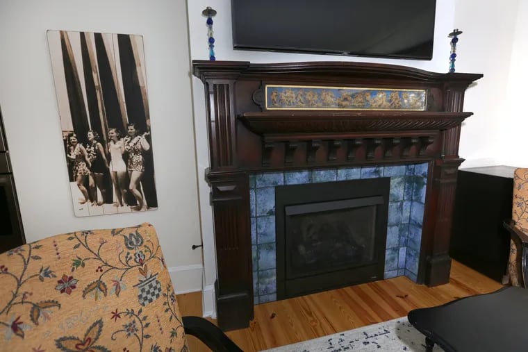 Adrienne Scharnikow found the American Bank Note Co. mantel from the 1800s for the fireplace on the second floor of her family's Shore home, now in Cape May.