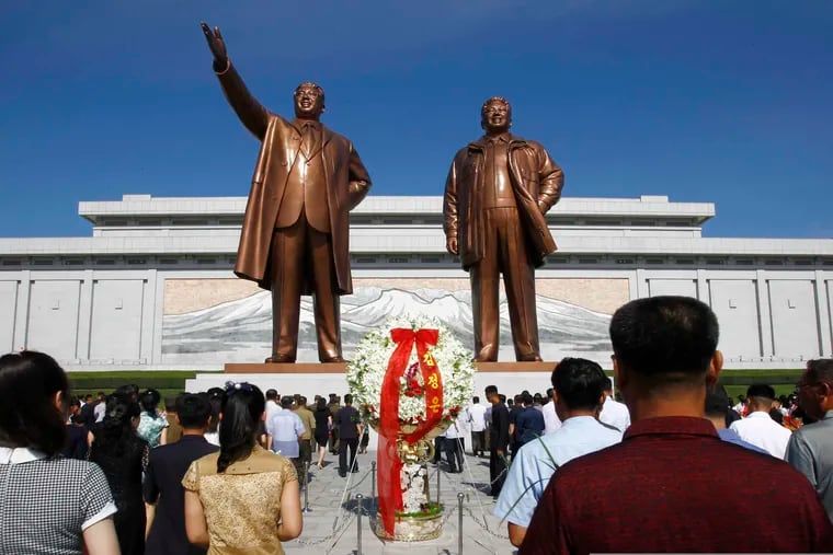 People visit Mansu Hill to pay tribute to the late leaders Kim Il Sung and Kim Jong Il on the occasion of the 25th anniversary of Kim Il Sung's death, in Pyongyang, North Korea. The Trump administration on Friday sanctioned a notorious if opaque constellation of North Korean hackers believed to be responsible for dozens of cyber attacks around the world, including the 2014 hacking of Sony Pictures.