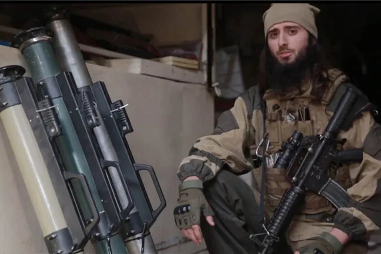 A screen grab from an Islamic State video showing Abu Hamza al-Amriki, who has been identified a Zulfi Hoxha of Margate, N.J.
