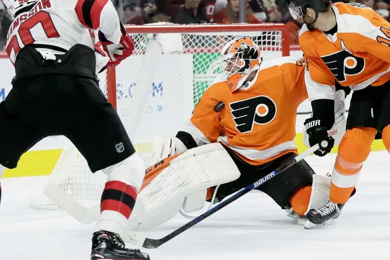 Flyers goalie Brian Elliott, shown making a save against the New Jersey Devils, has played in just 14 games this season but may return soon.