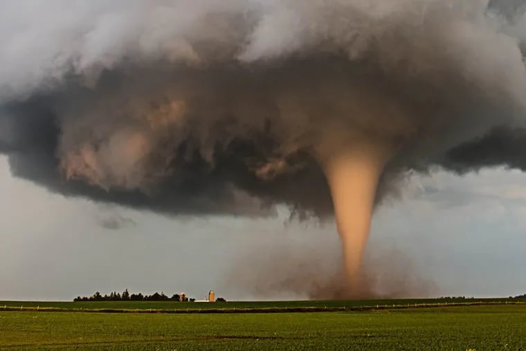 A twister captured on camera at sunset.