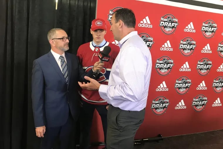 Former Flyer Keith Primeau (right) with his son, Cayden (center), at the NHL draft on Saturday. Cayden was selected in the seventh round by Montreal. SAM CARCHIDI/Staff