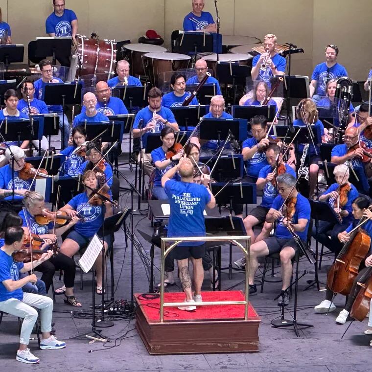 Philadelphia Orchestra music and artistic director Yannick Nézet-Séguin wears a blue musicians' union T-shirt in solidarity with his orchestra members during an open rehearsal in Saratoga Springs, N.Y. in August. The musicians, represented by The Philadelphia Musicians' Union, Local 77 of the American Federation of Musicians, are in negotiations for a new contract with the Philadelphia Orchestra and Kimmel Center Inc.