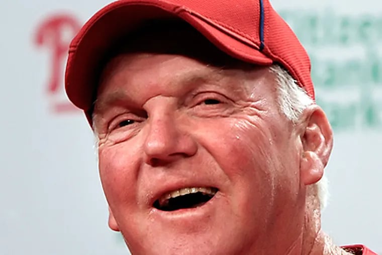 Charlie Manuel talks with the media before Friday's spring training game at Citizen's Bank Park.  (Steven M. Falk / Staff Photographer )