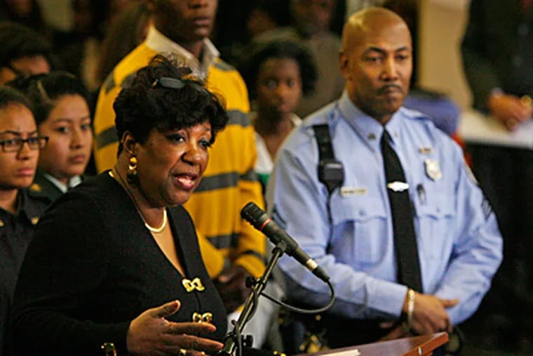 Philadelphia Schools Superintendent Arlene Ackerman speaks during a news conference last week. At right is Sgt. Robert Samuels, the school district cop who some say has been too aggressive with students in the past.