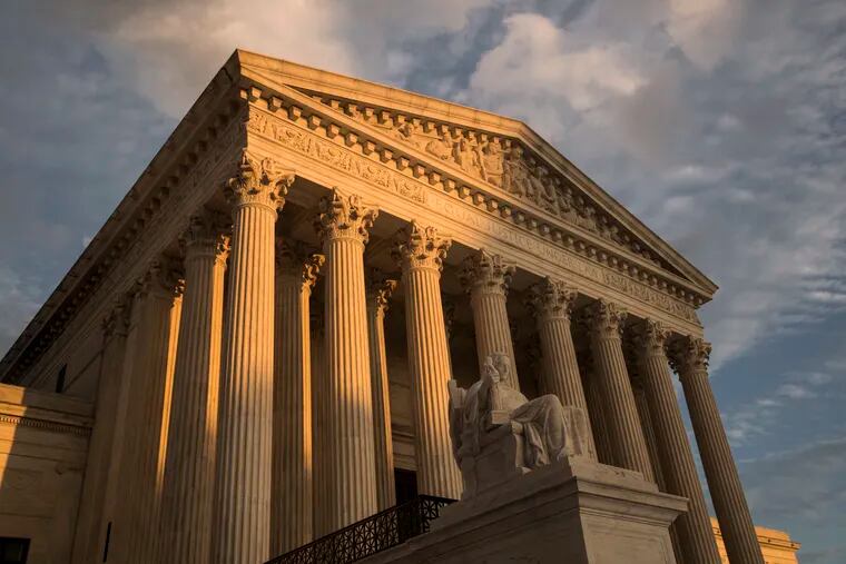FILE - In this Oct. 10, 2017, file photo, the Supreme Court in Washington, at sunset. The Supreme Court is turning to gun rights for the first time in nearly a decade, even though New York City gun owners already have won changes to a regulation they challenged in court. (AP Photo/J. Scott Applewhite, File)