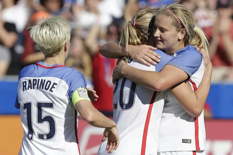 Allie Long (center) celebrates with Lindsey Horan (right) and Megan Rapinoe (left) after scoring a goal in the United States women’s national soccer team’s 6-0 win over South Korea.