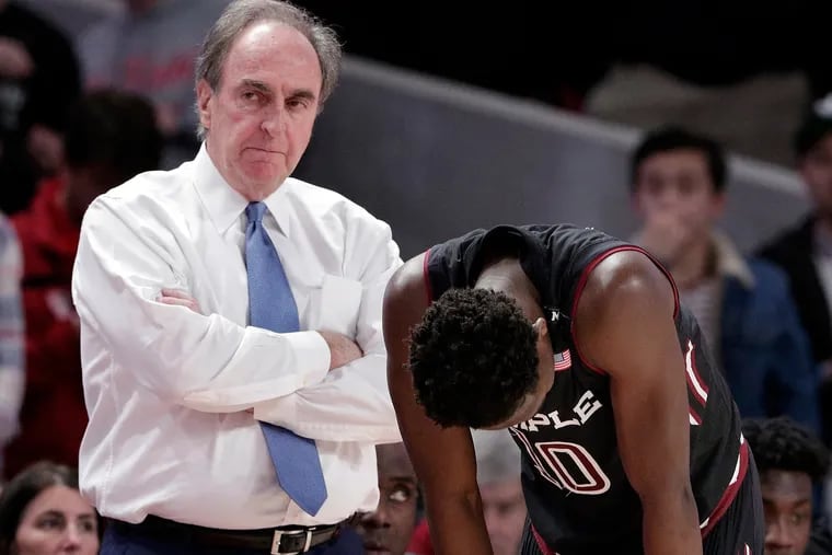 Temple head coach Fran Dunphy and guard Shizz Alston Jr. (10) during a timeout against Houston during the second half of an NCAA college basketball game Thursday, Jan. 31, 2019, in Houston. (AP Photo/Michael Wyke)