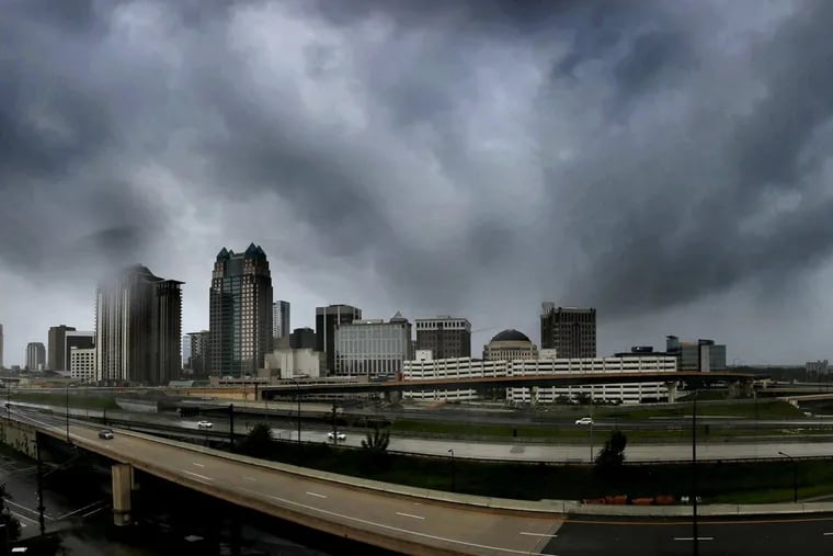 Storms clouds move in over the skyline of downtown Orlando associated with Irma in September. Alberto will affect Florida this weekend.