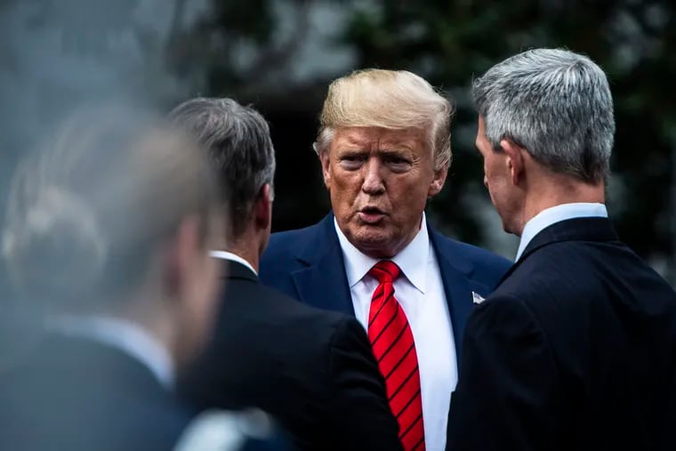 President Donald Trump chats on his way to the Oval Office on Thursday, Sept. 26, 2019. MUST CREDIT: Washington Post photo by Jabin Botsford.