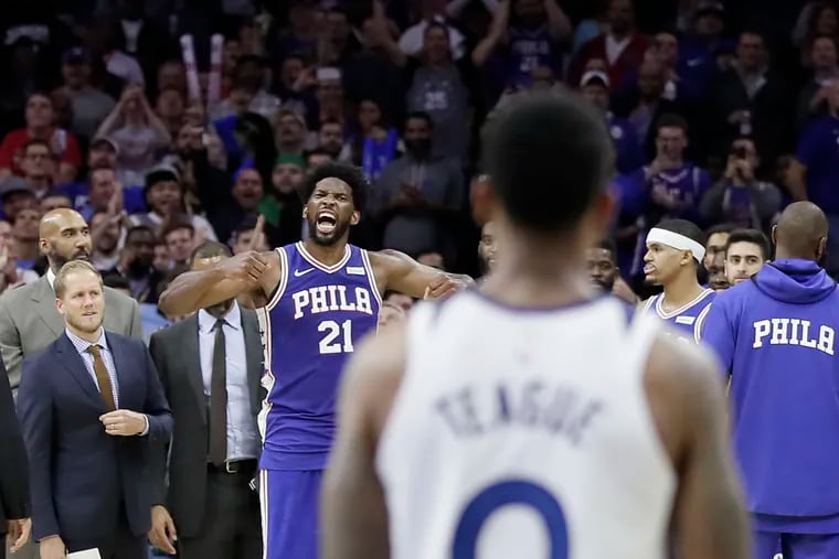 Joel Embiid reacts after learning he was ejected from the game against the Timberwolves.