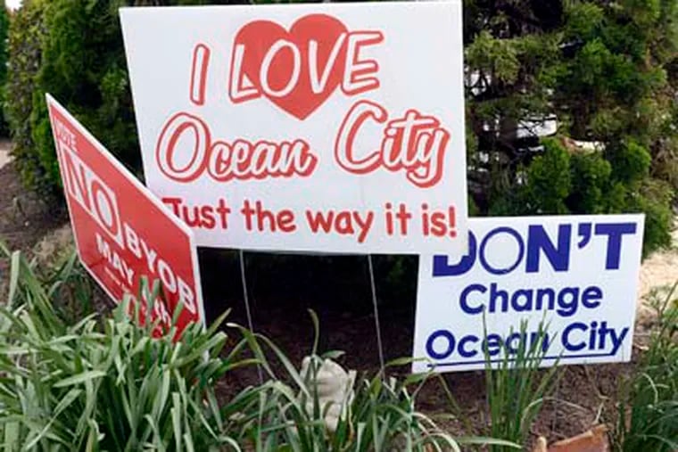 A trio of signs along Wesley Avenue in Ocean City against the BYOB referendum as citizens voted May 8, 2012. The pro-BYOB side did NOT post any yard signs in town. ( TOM GRALISH / Staff Photographer )