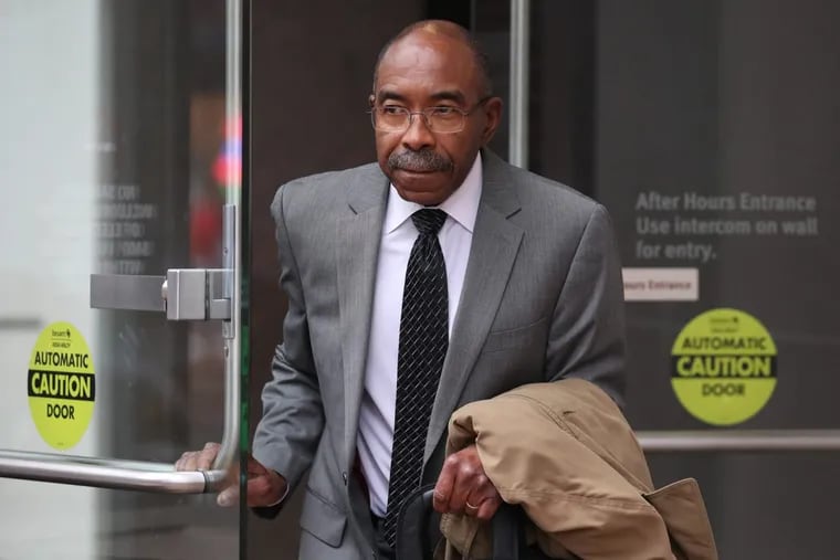 Former Philadelphia Sheriff John Green leaves federal court on April 3, the day a jury cleared him of some charges and deadlocked on others. He now faces a retrial.