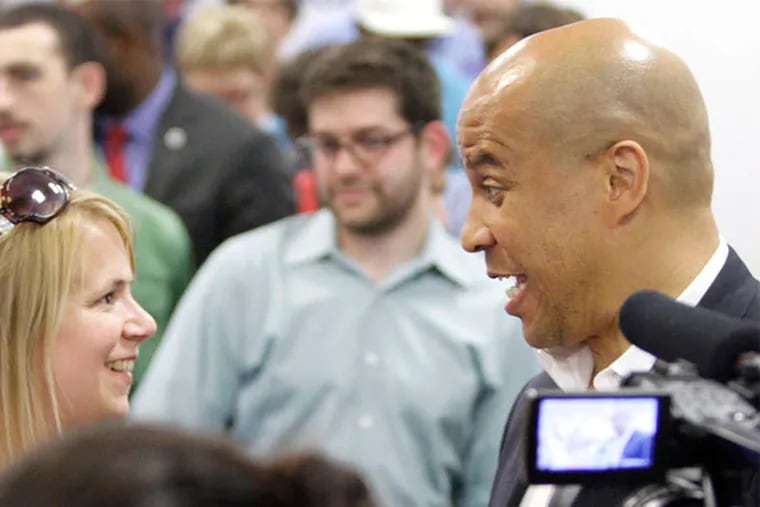 Booker at South Jersey Democratic headquarters last week in Cherry Hill. While some poke at his stardom, party officials say Booker's name and fund-raising ability are invaluable.