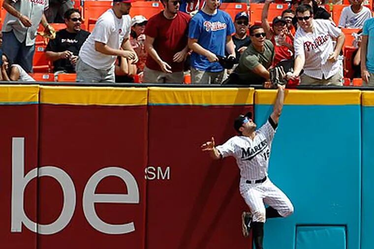 The Phillies officially filed a protest with MLB Monday over a fan interference call in Sunday's loss to Florida. (Lynne Sladky/AP)