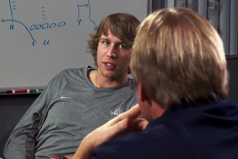 Then-quarterback prospect Nick Foles speaks to Jon Gruden during an appearance on ESPN’s “Gruden’s QB Camp” in 2012.
