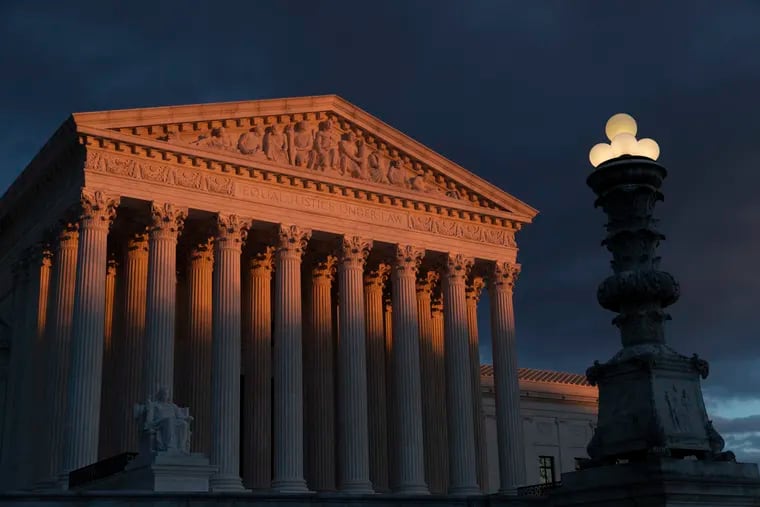 FILE - In this Jan. 24, 2019, file photo, the Supreme Court is seen at sunset in Washington. Key U.S. Supreme Court justices seemed inclined to let the Trump administration add a question about citizenship to the 2020 census in a clash that will shape the allocation of congressional seats and federal dollars. (AP Photo/J. Scott Applewhite, File)