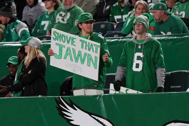 A fan holds a “Shove that Jawn” sign referring to the Brotherly Shove before a game against the Miami Dolphins at Lincoln Financial Field.