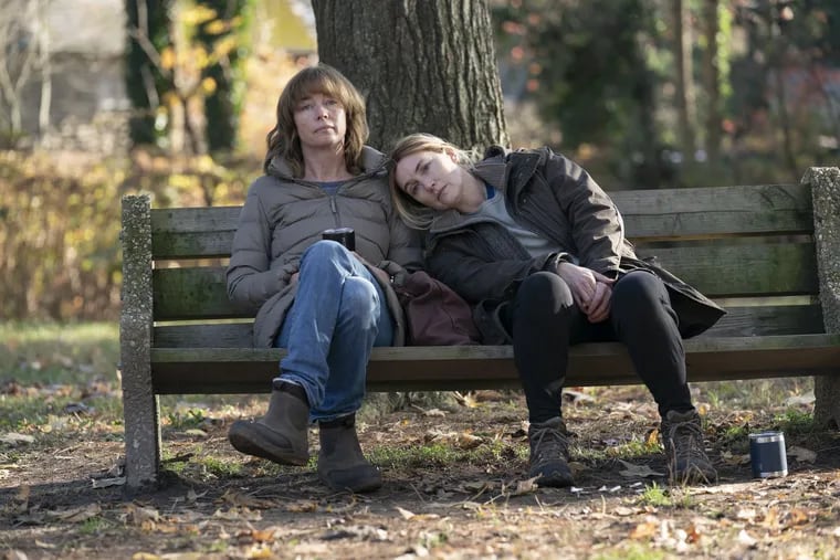 Julianne Nicholson (left) and Kate Winslet in a scene from "Mare of Easttown."