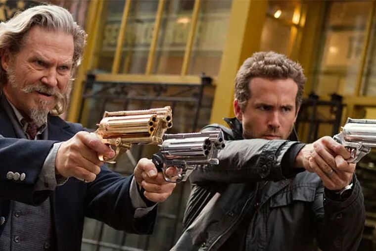 Jeff Bridges, left, and Ryan Reynolds are dead lawmen who get the chance to redeem themselves in "R.I.P.D."