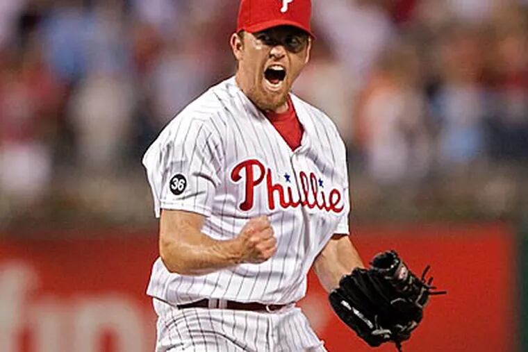 Brad Lidge pitched a perfect inning in Sunday's game. (David M Warren/Staff file photo)
