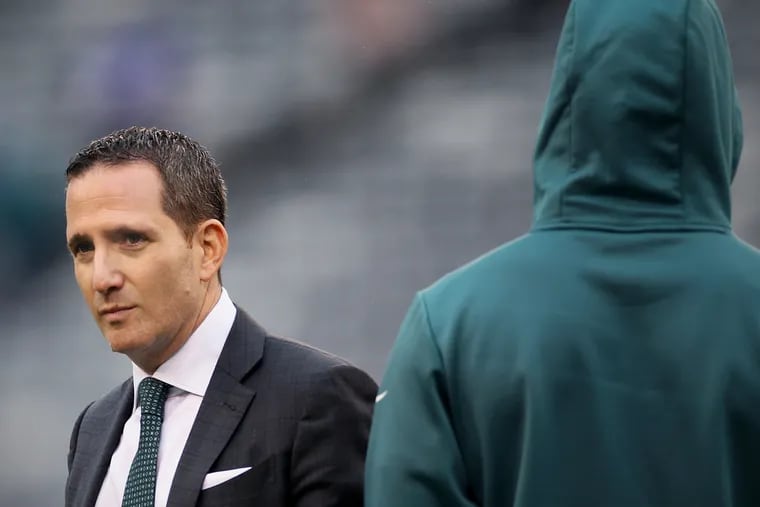 Eagles general manager Howie Roseman walking across the field before a game against the New York Giants in December.