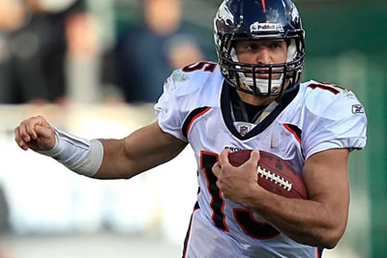 Broncos quarterback Tim Tebow's rushing prowess should pay off for fantasy football owners. (Marcio Jose Sanchez/AP Photo)