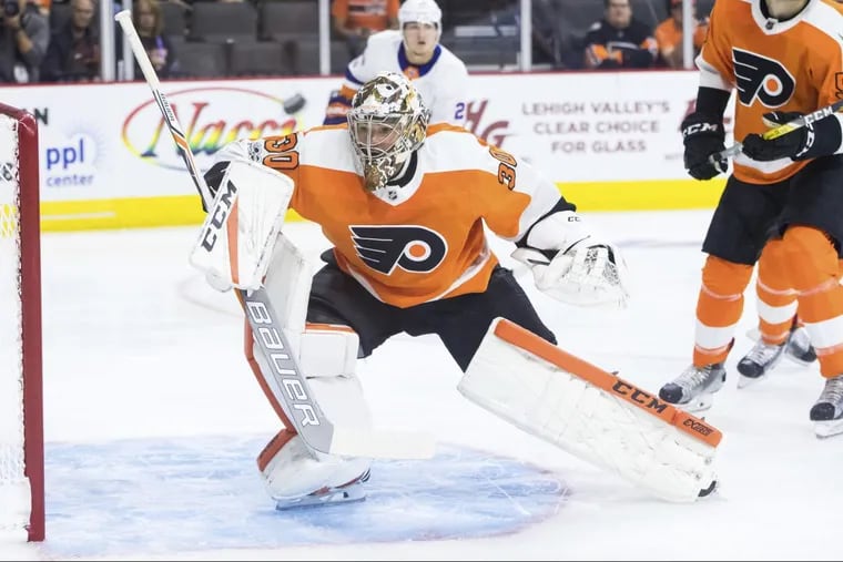 Flyers goalie Michal Neuvirth in action in a preseason game against the Islanders last week.