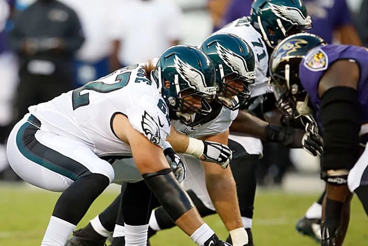 Jason Kelce prepares to snap the football against the Ravens.