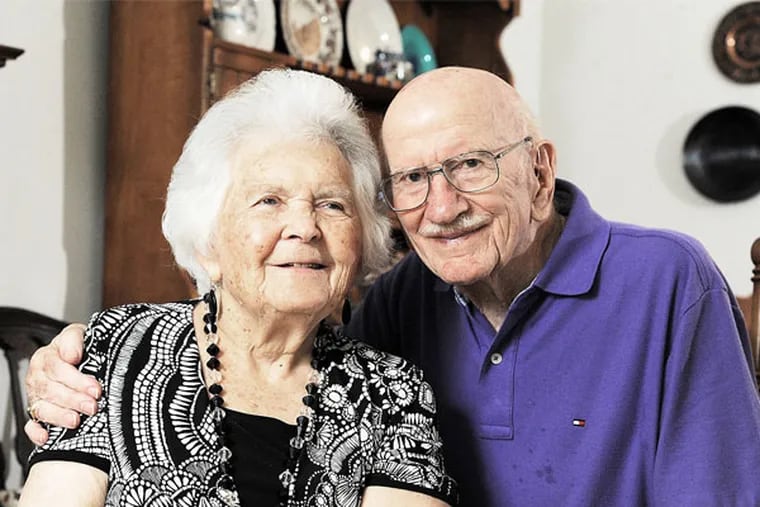 Portrait of Don, 94, and Martha Fletcher, 91, married 71 years, in their apartment in Voorhees. Don (he prefers Don over Donald) has written a new book about their struggles with her Alzheimer's Disease. ( CLEM MURRAY / Staff Photographer )