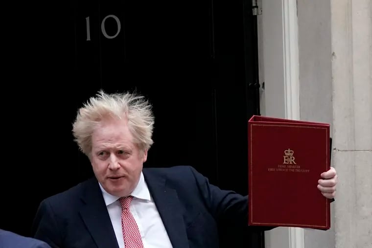 Britain's Prime Minister leaves 10 Downing Street, London on Monday to head to the House of Commons.