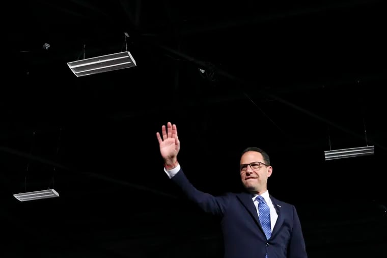Josh Shapiro waves before speaking at his Election night watch party at the Greater Philadelphia Expo Center in Oaks, Pa. on Tuesday, Nov. 8, 2022.