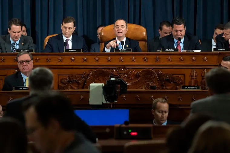 House Intelligence Committee Chairman Adam Schiff of Calif. (center) speaks during the House Intelligence Committee hearing on Wednesday.