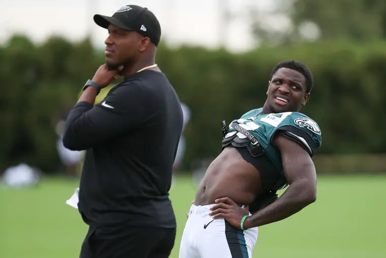 Eagles wide Jalen Reagor stretches before the start of a joint training camp with the New England Patriots at the NovaCare Complex in South Philadelphia on Tuesday, Aug. 17, 2021.