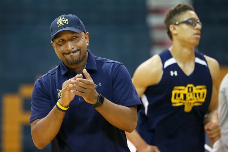 New La Salle men' basketball coach Ashley Howard oversees a team workout at the Tom Gola Arena.