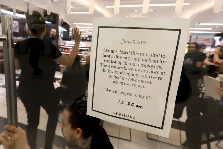 Sephora employees gather in one of the company's closed stores, in New York, Wednesday, June 5, 2019. Sephora is closing its U.S. stores for an hour Wednesday to host inclusion workshops for its employees, just over a month after R&B star SZA said she had security called on her while shopping at a store in California.