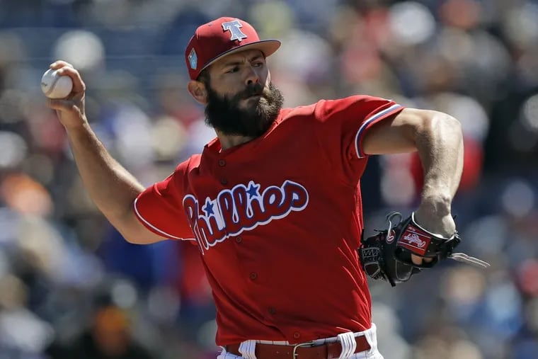 Jake Arrieta pitches during the first inning against the Tigers.