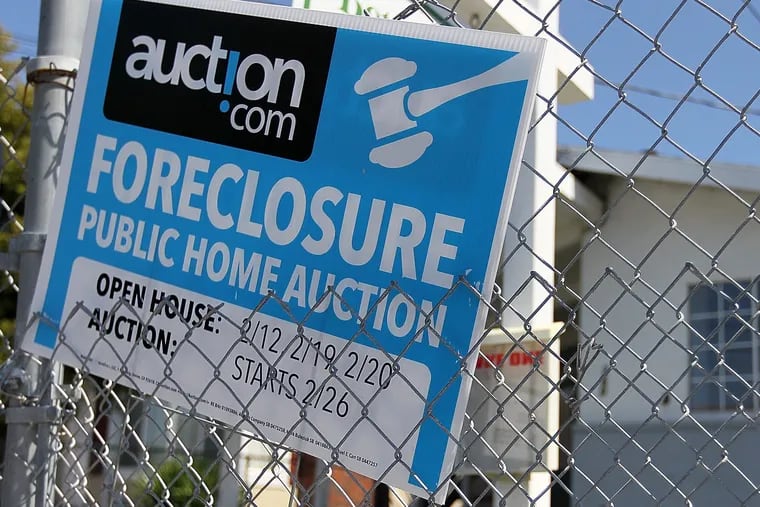 RICHMOND, CA – APRIL 06: A foreclosure sign hangs on a fence in front of a foreclosed home on April 6, 2011 in Richmond, California. The California Housing Finance Agency is expanding its $2 billion foreclosure relief initiative that will now help those who refinanced or took out home equity lines of credit. The agency's largest program offers $875 million in temporary financial help to people who have lost their jobs or had pay reductions and will provide up to $3,000 a month for six months to cover mortgatge payments and related costs. (Photo by Justin Sullivan/Getty Images)
