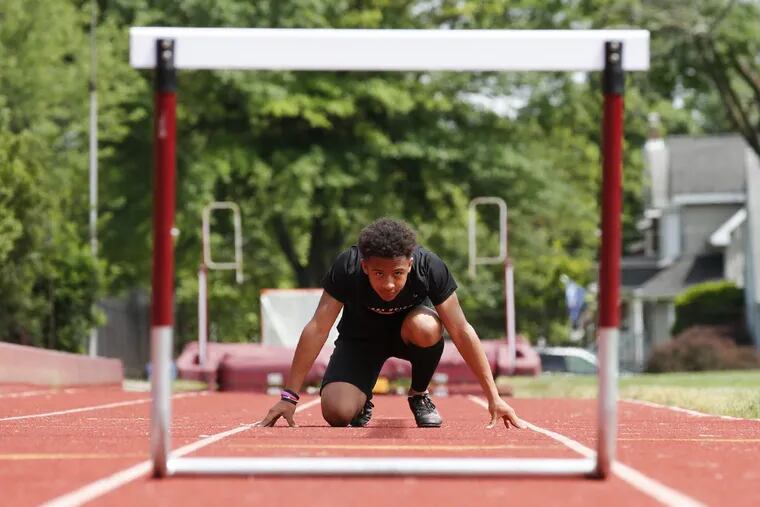 Haddon Heights’ Cam Kee prepares to run over the hurdles.