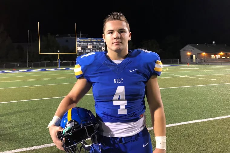 Downingtown West senior tight end and middle linebacker Ryan Wetzel replaced injured quarterback Will Howard and led his team to a win over Downingtown East on Friday night.