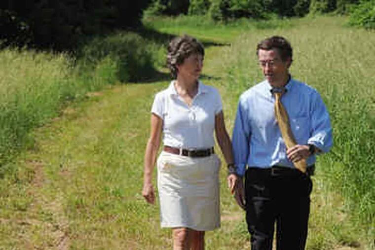 The Natural Lands Trust's Molly Morrison walks with John Quigley, state conservation secretary, in Berks County.