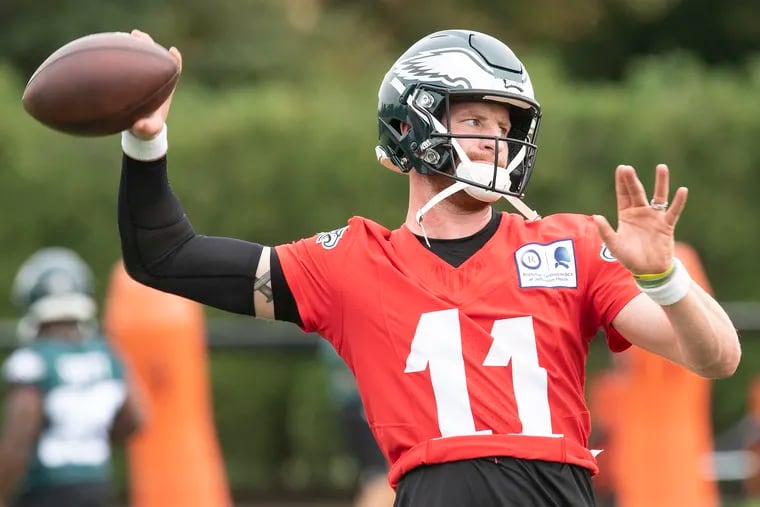 Eagles quarterback Carson Wentz, shown at practice Thursday, could have a big day Sunday against the Redskins.