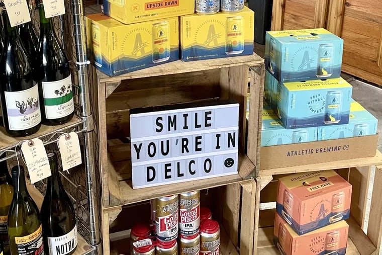"Smile You're in Delco" greets the thirsty shoppers entering the bar at 320 Market Cafe in Swarthmore.
