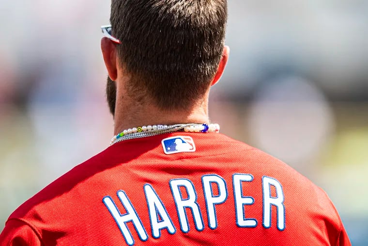 Philadelphia Phillies slugger and reigning National League MVP Bryce Harper looks on during a game during spring training.