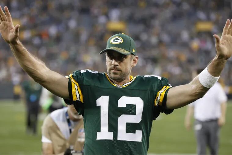 Packers QB Aaron Rodgers celebrates after a game against the Bengals on Sunday.
