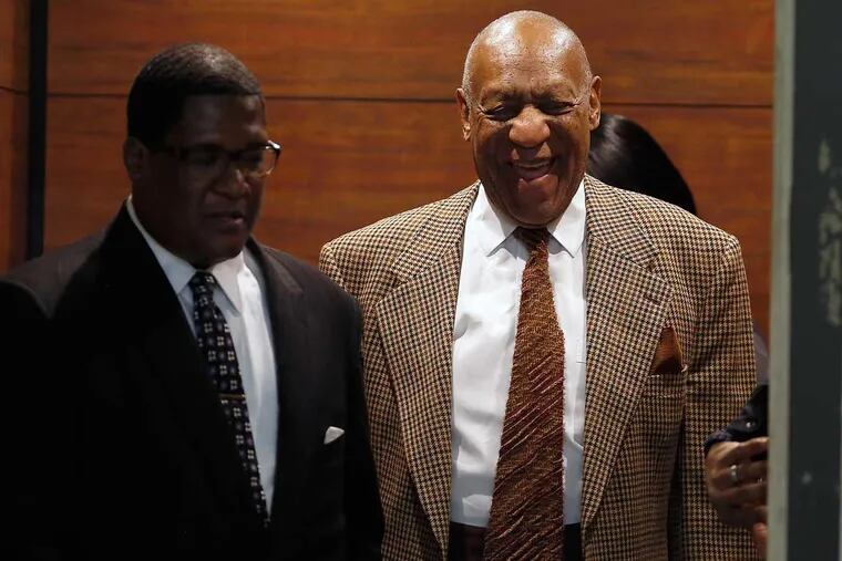 Bill Cosby laughs as he returns to court Tuesday in Norristown for what is expected to be a two-day hearing.