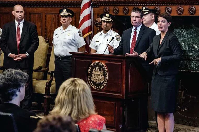 James Henry (podium), special agent in charge of Philadelphia's Secret Service Unit, talks in the Mayor's Reception Room at City Hall on Thursday, July 7, 2016.