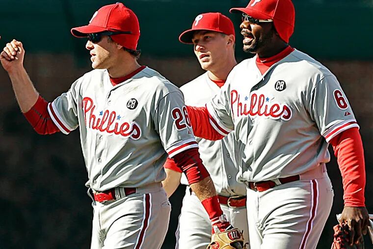 Phillies second baseman Chase Utley and first baseman Ryan Howard. (Nam Y. Huh/AP)
